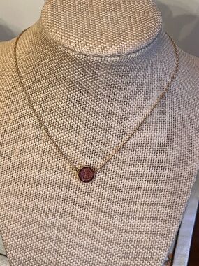 Avon 15” gold tone necklace with round purple pedant